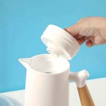 1 件 1000ml 简约时尚欧式风格，家用热水袋，冷水袋，带木柄，容量大，适用于宿舍、家庭、办公室，可作为节日礼物 - 彩色 - 查看 5