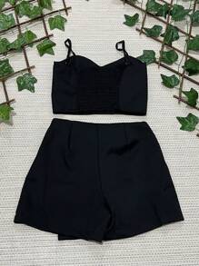 Conjunto laços alfaiataria short saia e top cropped , short saia com zíper lateral , cropped de alça com regulador e 2 laços na frente ,e com bojo.  Com lastex nas costas  tamanho P 38 M 40 G 42 - Preto - Visão 3