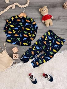 a DORMIR Set de Pijama Azul Estampado De Dinosaurios Camiseta Manga larga y Pantalón Calentita Para Bebé - Azul - Ver 2