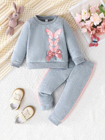 2 件套女婴长袖圆领可爱粉色蝴蝶结印花运动衫和多色拼布裤休闲可爱户外装，秋季