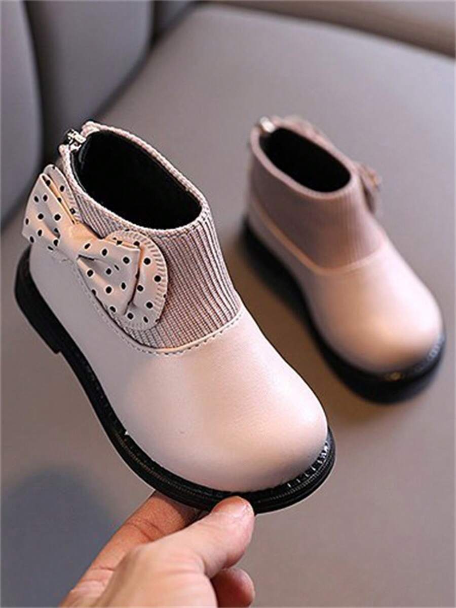 زوج من الأحذية البوت ذات اللون الأحادي للبنات مع فيونكة، بنعل مقاوم للانزلاق والاستهلاك ، أنيق ودافئ (مقاس أصغر بمقاس واحد) - وردي - مشاهدة 1