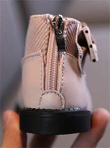 زوج من الأحذية البوت ذات اللون الأحادي للبنات مع فيونكة، بنعل مقاوم للانزلاق والاستهلاك ، أنيق ودافئ (مقاس أصغر بمقاس واحد) - وردي - مشاهدة 6