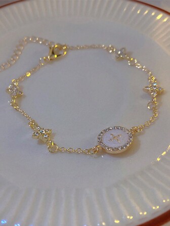 1 件女士时尚优雅华丽奢华钻石镶嵌星射线十字圆形吊坠链手链，适合日常佩戴