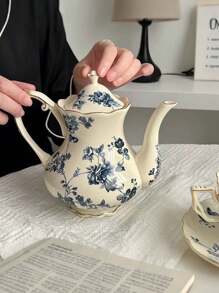 Dies ist ein Orchideen-Tassen- und Untertassen-Set zusammen mit einem Orchideen-Teekanne. Beide sind aus hochwertigem Keramik gefertigt, mit feiner Textur und warmem Glanz, was einen hochwertigen Eindruck vermittelt. Schulanfang