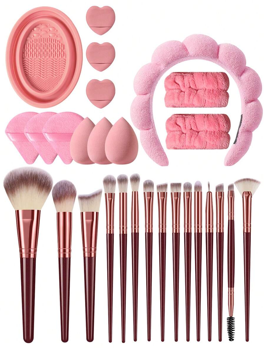 Juego completo de 28 piezas que incluye: 15 brochas de maquillaje, 3 esponjas de maquillaje, 3 esponjas de maquillaje en forma de triángulo, 3 aplicadores de maquillaje con el dedo, 1 tazón para limpiar brochas, 1 diadema y 2 muñequeras. Herramientas para maquillaje en polvo, líquido y facial.