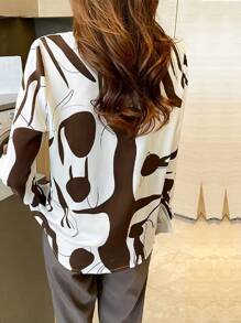 Koszula damska wiosna/jesień z kołnierzykiem typu turndown, modnie dopasowana koszulka polo z długim rękawem i kierunkowym abstrakcyjnym nadrukiem