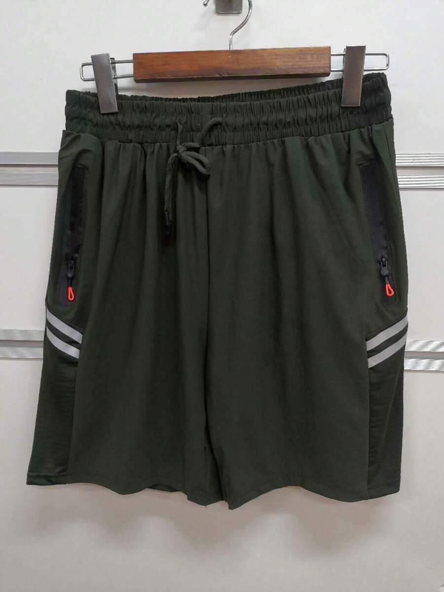 O vendedor recomenda shorts esportivos masculinos/tecido de secagem rápida/elastano/secagem rápida/bolsos com zíper.