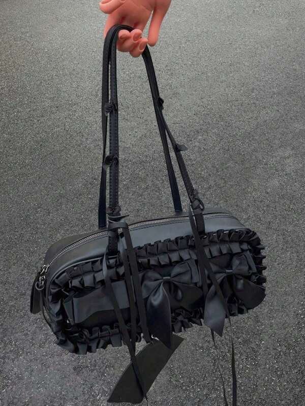 Bolsa versátil de axila com laço preto de alta qualidade, bolsa de ombro sazonal feminina, bolsa feminina estilo motocicleta doce e descolada