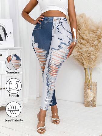 女式大码仿牛皮印花破洞紧身打底裤