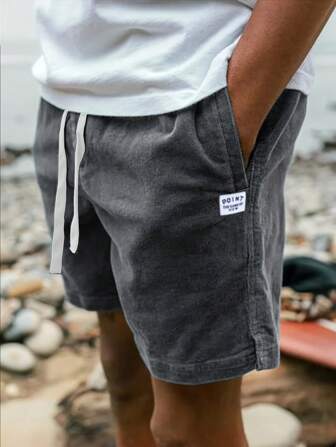Short bermuda casual ample avec cordon de serrage à la taille et poches, imprimé lettres pour hommes