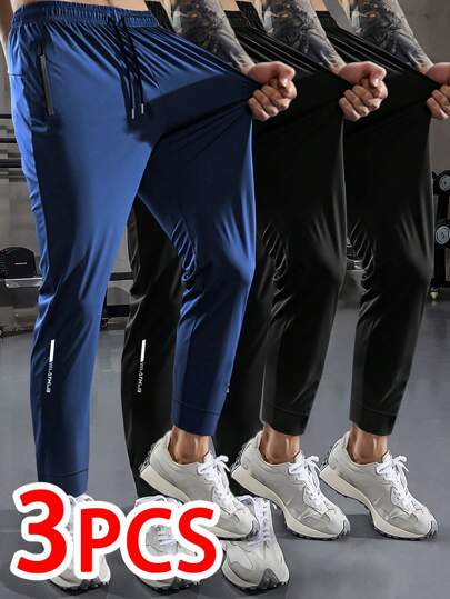 3 piezas Pantalones largos casuales para hombre de primavera y verano con cintura con cordón, bolsillos, cremallera, unicolor, elásticos, aptos para deporte, fitness, running y exteriores con raya reflectante