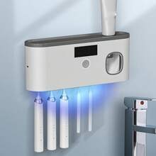 1 pieza Esterilizador de cepillo de dientes UV, soporte para cepillo de dientes montado en la pared 99% libre de bacterias con dispensador automático de pasta de dientes, sin necesidad de perforar, recargable con energía solar y DC5V, decoración para el hogar y el baño, decoración de otoño, de vuelta a la escuela