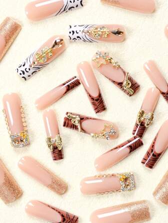 Sanrio 24Pcs Long Coffin Nail Nail Patches White Leopard Gold Glitter French Cute Metal Diamond Three-Dimensional Gold Us Dollar Gun Diamond Gold Star Pendant Diamond 3D Gold Flash Diamond Gold Bow Diamond Wearable Nail Set Suitable For Women'S Daily Wear Parties (With: A Piece Of Jelly Glue And A Rolling Strip) Press On Nails Nail Supplies Nails