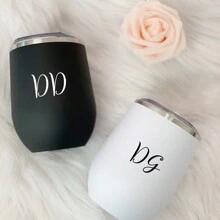 1 pieza Taza con forma de cascarón de huevo de doble capa de acero inoxidable con aislamiento al vacío, adecuada para el hogar, la oficina, los viajes al aire los deportes. 340ml. La taza blanca tiene una etiqueta con un logotipo de cristal negro y la taza negra tiene una etiqueta con un logotipo de cristal blanco