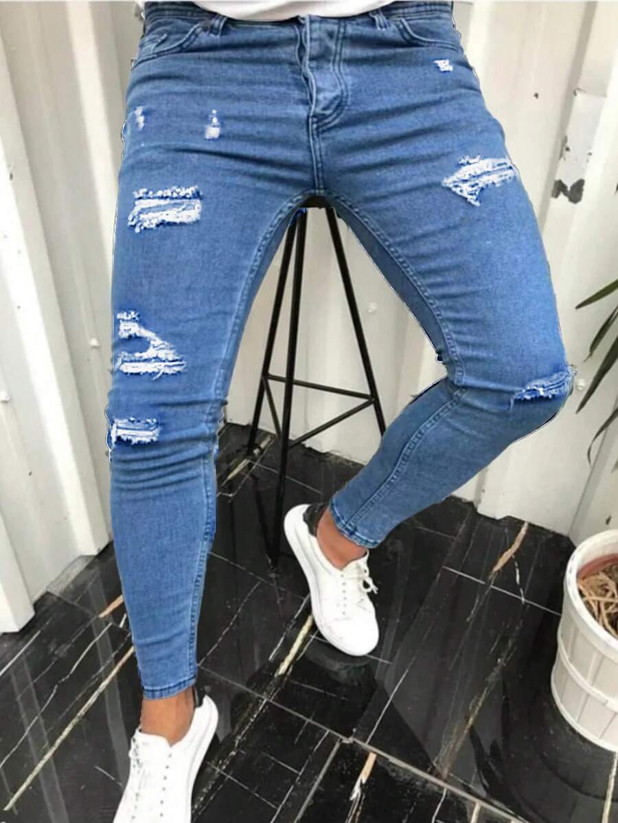 Jeans casuales de mezclilla ajustados y elásticos rasgados para hombre