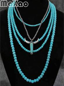 Un collier pendentif tête de taureau vintage en turquoise artificielle multicolore pour femmes, un cadeau d'anniversaire de vacances. Plus de bijoux de style vintage dans la boutique.