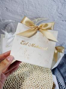 10pcs Elegant Eid Mubarak Mini Gift Boxes Stylish White Favor Boxes With Gold Foil Lettering And Delicate Ribbons. Perfect For Storing Candies, Chocolates, And Small Gifts. Ideal For Eid Celebrations, Festive Occasions, And Thoughtful Surprises. Chic Packaging For Memorable Moments