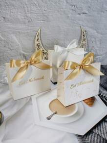 10pcs Elegant Eid Mubarak Mini Gift Boxes Stylish White Favor Boxes With Gold Foil Lettering And Delicate Ribbons. Perfect For Storing Candies, Chocolates, And Small Gifts. Ideal For Eid Celebrations, Festive Occasions, And Thoughtful Surprises. Chic Packaging For Memorable Moments