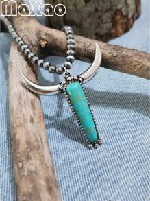 Un collier pendentif tête de taureau vintage en turquoise artificielle multicolore pour femmes, un cadeau d'anniversaire de vacances. Plus de bijoux de style vintage dans la boutique.