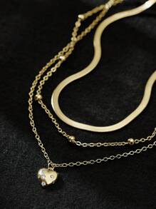 Conjunto de 3 peças de colar de aço inoxidável com pingente de coração embutido em zircônia cúbica, corrente de clavícula moderna em camadas, adequada para uso diário e de férias (quantidade aleatória de contas) - Ouro amarelo - Ver 3