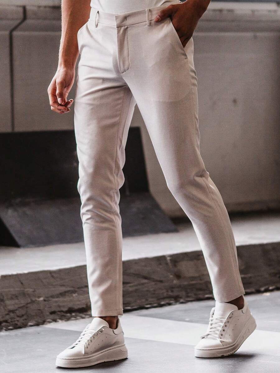 Pantaloni casual da uomo con tinta unita, tasche oblique, versatili e alla moda, adatti per tutte le stagioni