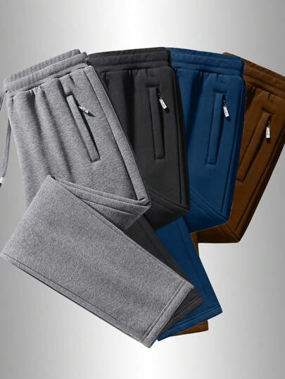 1 条男友风男士长裤，面料舒适柔软，配有拉链口袋，厚度适合秋季穿着，适合运动休闲外出