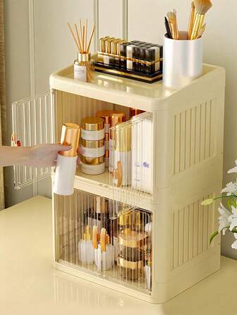 1个多功能可折叠桌面双门化妆品收纳盒，大容量防水防尘塑料整理盒，大尺寸，适用于梳妆台、美甲工具、指甲油和胶水收纳架，也适用于浴室梳妆台、口红、化妆刷、乳液、眼影、指甲油、珠宝首饰和桌面收纳，可用于房间、家居、卧室、浴室、粉色房间、客厅装饰，也可作为珠宝盒、化妆刷收纳袋、化妆刷架、香水收纳盒、化妆包，是送给女性的礼物、圣诞礼物和送礼佳品。