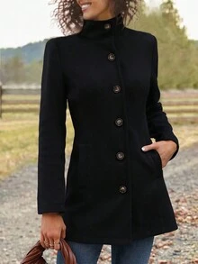 Damski, dopasowany w talii, jednorzędowy, z kieszeniami, wysokim kołnierzem, stójką i klapami, czarny, średniej długości, wełniany płaszcz, świąteczny