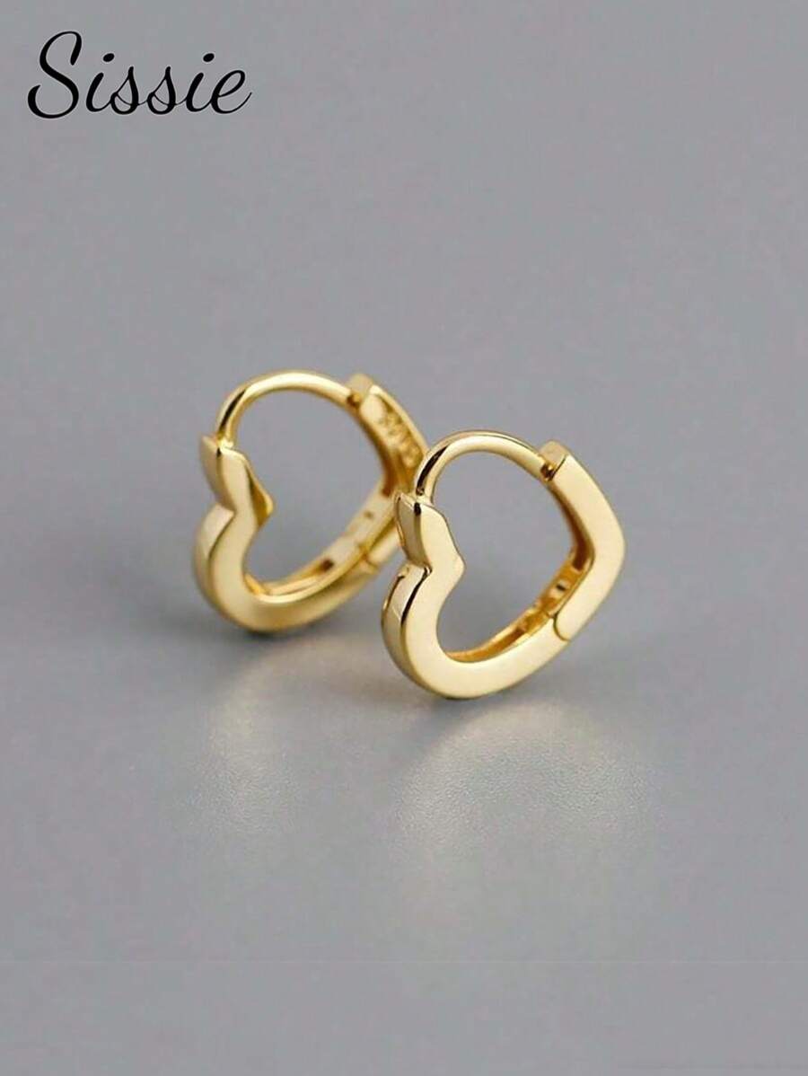 1 đôi bông tai hình trái tim màu vàng thời trang, thích hợp cho các bạn gái đeo đi dự tiệc, tiệc chiêu đãi, lễ hội, hẹn hò, đám cưới và các dịp khác, cũng là món quà sinh nhật hoặc quà tặng nhân dịp tựu trường lý tưởng.