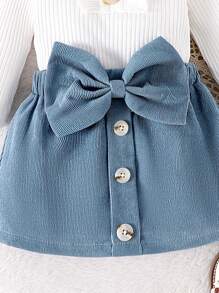 2pcs Baby Girl Solid Color Buttoned Cap Sleeve Onesie & Bowknot Decor Skirt Set With Hair Scrunchie