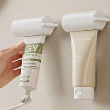 1pc Toothpaste Dispenser Stand, Rotating Hands-Free Toothpaste Squeezer Back To School