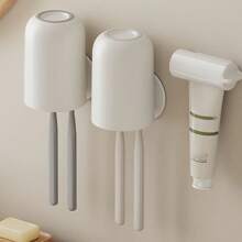 1pc Toothpaste Dispenser Stand, Rotating Hands-Free Toothpaste Squeezer Back To School