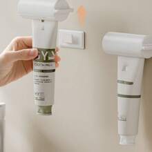1pc Toothpaste Dispenser Stand, Rotating Hands-Free Toothpaste Squeezer Back To School