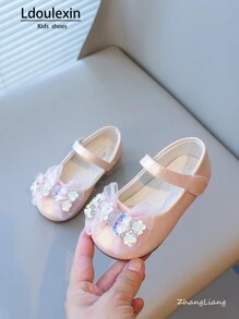 Nuove scarpe piatte con fondo morbido antiscivolo per ragazze con fiocco e design a strappo, stile principessa