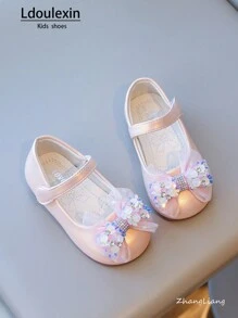 Nuove scarpe piatte con fondo morbido antiscivolo per ragazze con fiocco e design a strappo, stile principessa