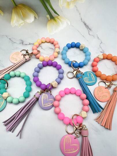 1 قطعة من الخرز السيليكوني الساحر، خرز يضيء في الظلام، شريحة خشبية بشكل قلب، سلسلة مفاتيح بشرابة، تعليقة للحقيبة، سلسلة مفاتيح السيارة، هدية للأصدقاء