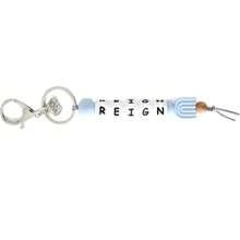 1 个定制彩虹钥匙扣，可用作名牌包挂。