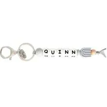 1 个定制彩虹钥匙扣，可用作名牌包挂。