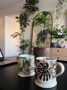 This 380 - Ml Floral - Themed Mug Is A Wonderful Addition To Any Space. Choose From Five Unique Patterns: The Delicate White Chrysanthemum, The Noble Peony, The Romantic Rose, The Pure Lily Back To School - Same Style - View 9