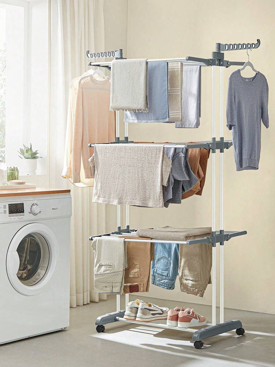SONGMICS Étendoir à Linge, Séchoir Mobile à 4 Niveaux, avec roulettes, Pliable, 63,5 x 128 x 173 cm, Grande Capacité, Montage Facile, Utilisation Intérieure et Extérieure, Blanc - Argent - Voir 1