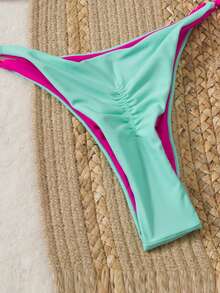 Bikini de estilo cruzado en la espalda de metal de alta gama, bañador sexy sin espalda de unicolor con tirantes trenzados, nueva moda 2025