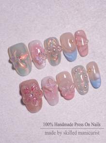10 uñas postizas ovaladas cortas reutilizables con diseño de flor 3D y patrón de cinta en múltiples colores de caramelo, hechas a mano, con decoraciones de lazos para diseños de arte de uñas para mujeres y niñas en todas las estaciones
