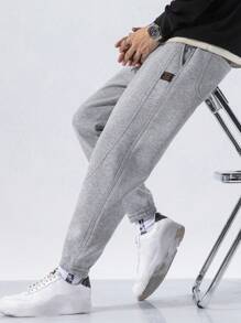 男式休闲拉链细节抽绳腰部运动慢跑运动裤