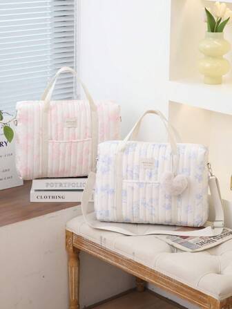 1 件多功能大容量绗缝妈咪包，可挂在婴儿车上并用作手提包