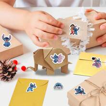 500PCS Disney Lilo And Stitch Stickers Roll 10 Styles Funny Movie Cartoon Stickers Stitch Party Favors Water Bottles Vinyl Sticker (500PCS Per Roll)