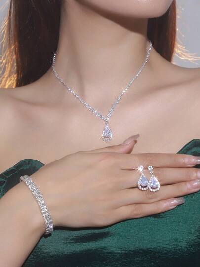 4 piezas Conjunto de joyería nupcial que incluye (1 collar + 1 par de aretes + 1 pulsera), decorado con rhinestones y colgantes en forma de lágrima, exudando un ambiente elegante y refinado - Adecuado para uso diario, bodas, fiestas y otras ocasiones.