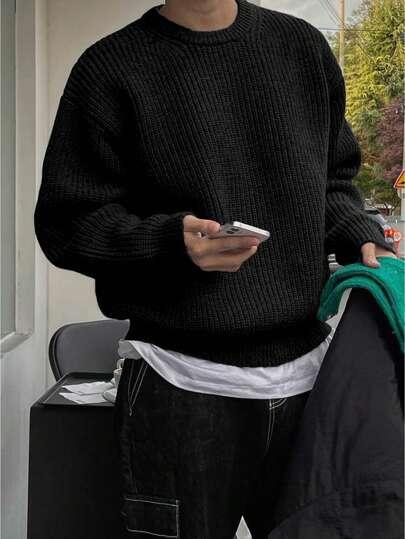 Lehký, volný pletený svetr s texturovaným vzorem, ležérní unisex design, vhodný na podzim a zimu