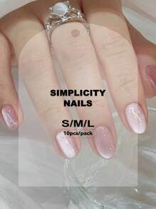 手工美甲配件套装，包括 10 件短椭圆形按压式指甲，可爱的粉色水晶猫眼设计，适合女孩、圣诞派对或日常佩戴，含 1 件指甲箔贴纸和 1 件指甲条用品 - 淺粉色 - 查看 3