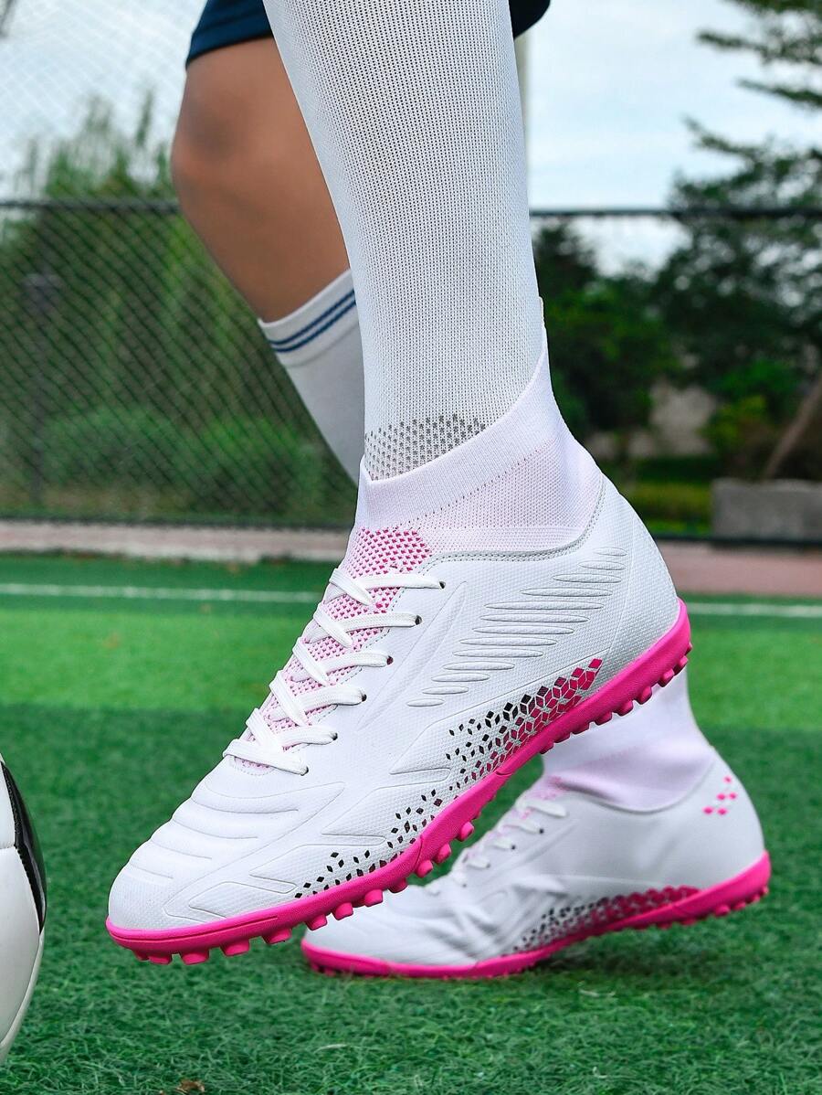 1 双男女通用足球钉鞋，硬地/人造草钉足球鞋，高帮户外运动运动鞋，适合球队、足球、防滑橡胶鞋底、轻质高性能设计，厂家直销