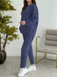 女士休闲纯色简约圆领长袖上衣，搭配女士时尚休闲纯色简约圆领长袖上衣，适合春秋季穿着。 - 藍色 - 查看 2